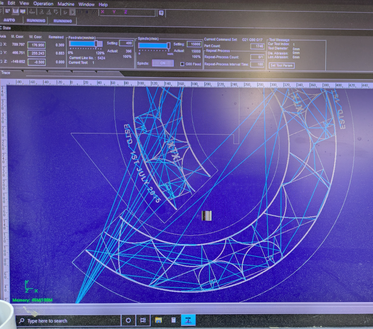 Screenshot of CNC software showing toolpath layout for engraving brass sign